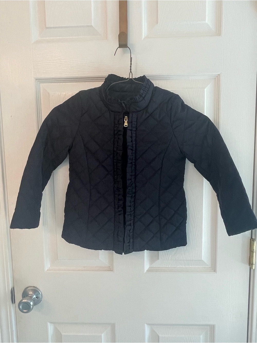 Girls' Quilted Navy Puffer Jacket with Ruffle Trim